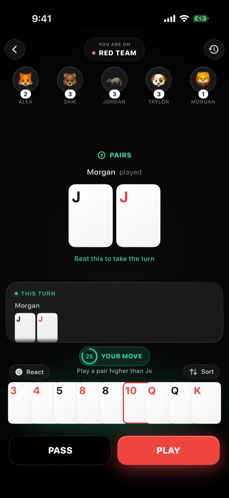 A Red 10 hand in progress: a pair of jacks on the table, YOUR MOVE, and your thirteen cards below.